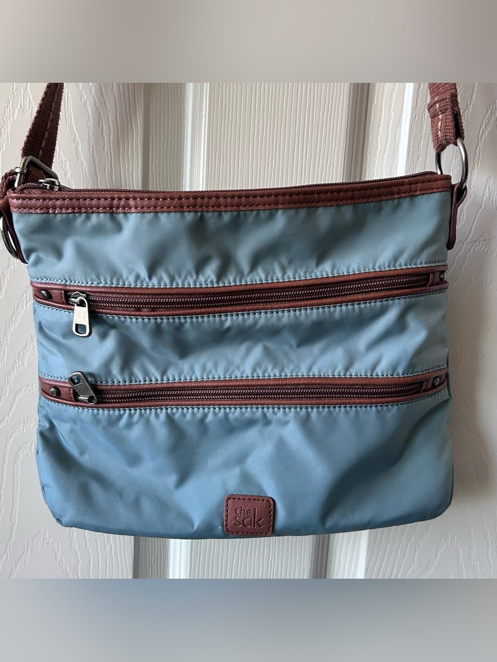 The Sak Blue Crossbody Bag with Brown Trim & Strap